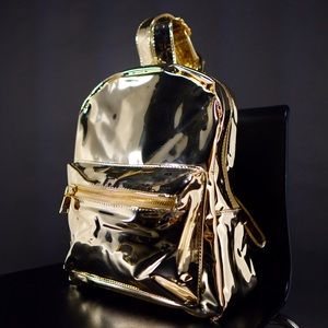 Gold backpack with pockets